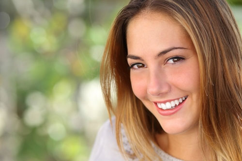 Why Drinking More Water This Summer is So Important for Your Smile